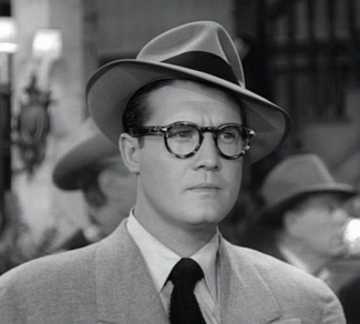 George Reeves as Clark Kent