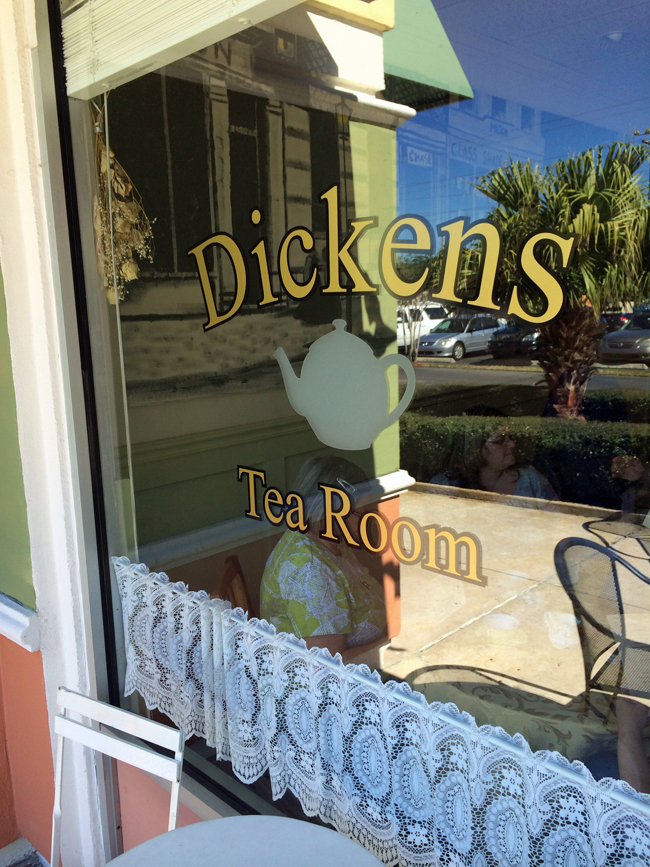 WIndow sign for Dickens Tea Room