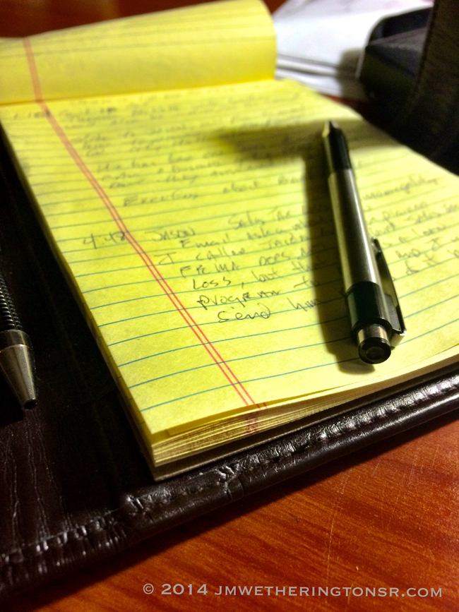 notebook pen on desk