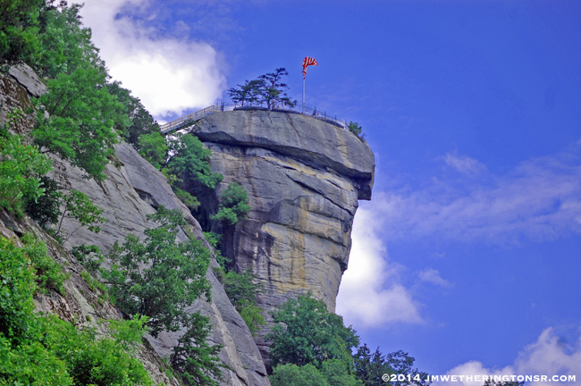 This is the view of Chimney Rock from the parking lot. We're going to walk 491 steps to the top of this rock, where you see the American flag,